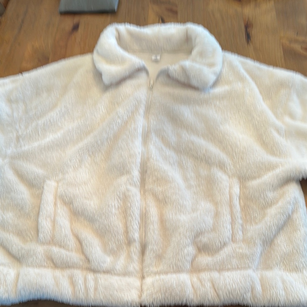Woman’s Old Navy Fuzzy jacket; zip up
Size Medium

Off white